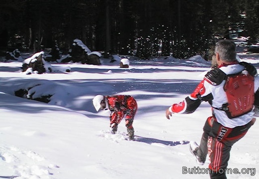 12 John kicks the snow at Briana