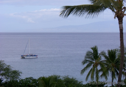 The view from our room's balcony with a boat anchored