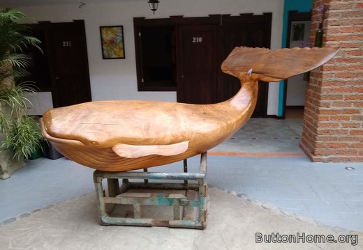 Wooden whale in the Hotel Salento Real lobby
