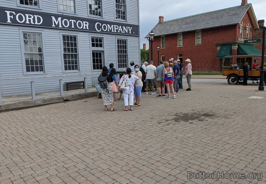 Model T in front of reconstructed Ford 1st factory