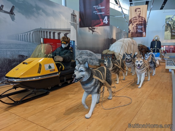 dog sled with snowmobile sled
