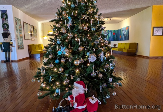 Santa is riding around the tree