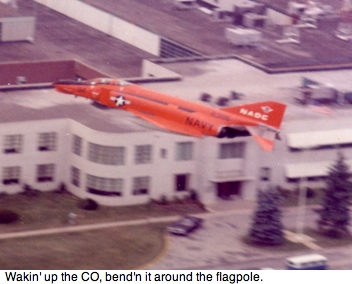 NADC QF-4B flying near the flagpole