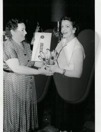 Florence Lamb Button (left) receiving Fair Blue Ribbon